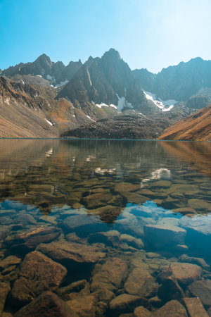 The beautiful reflection of rocky mountains in the lakeの写真素材