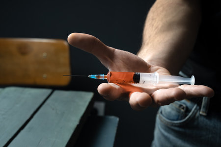 Young Man Offering Drugs Injection, Addictionの写真素材