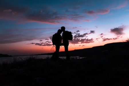 Traveler Loving Couples at Sunsetの写真素材