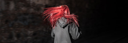 The Girl Escapes from Pursuit Through a Tunnel â Thrilling Escapeの写真素材