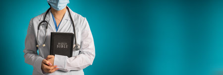 Christian Doctor with the Bible: Faith and Healingの写真素材