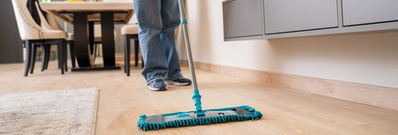Sparkling Clean: A Woman Mops the Floor