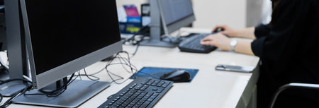 Employees Working on Computers in Office