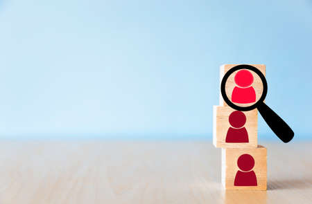 Wooden blocks with the image of employees. The concept of management in a team. Recursos humanos.