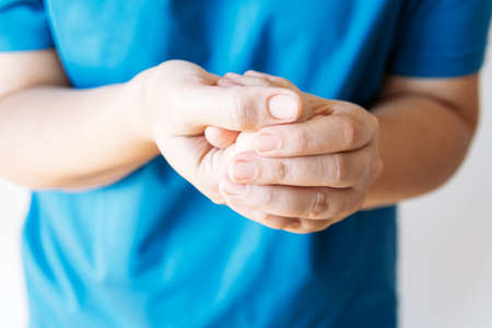 Young woman putting her hands in different positions.
