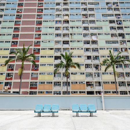 Old public housing with chair in Hong Kongのeditorial素材