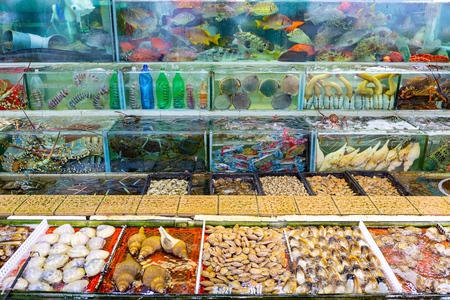 Seafood market fish tank in Sai kung Hong Kongの写真素材