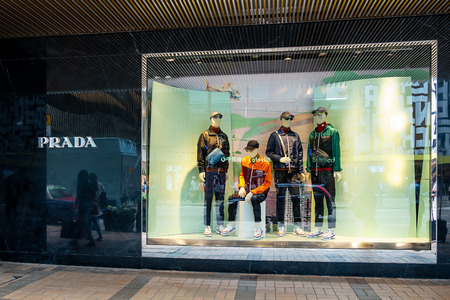 Tsim Sha Tsui, Hong Kong, China - April 09, 2019: Prada brand logo and window display seen in Tsim...