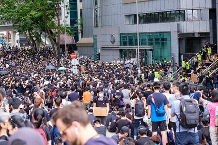 Wanchai, HONG KONG - June 21, 2019: Protest at Wanchai Hong Kong Police Headquarter. Protestors remembering the dead of protestor on June 15 2019.のeditorial素材