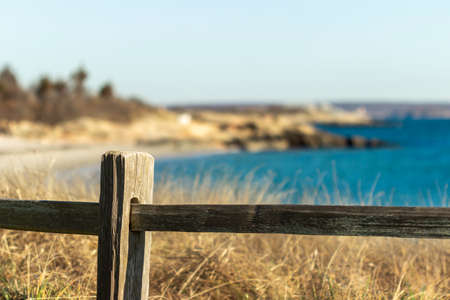 Fence around the beautiful beach with a beautiful blue sky