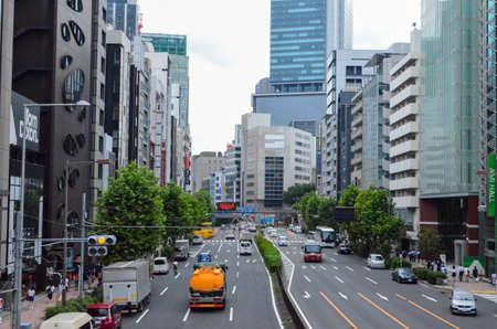 Japan, a large metropolis during the day. A close up of a busy city streetのeditorial素材