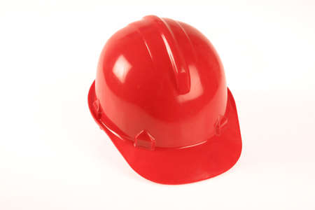 A red hard hat on a white background.の写真素材