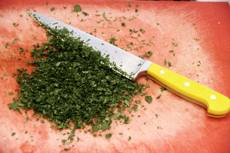 parsley and a knife の写真素材