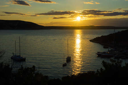 Harbor at sunset の写真素材