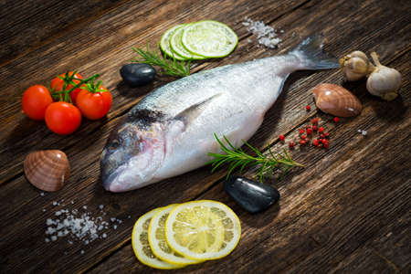 Fresh dorade with aromatic ingredientsの写真素材