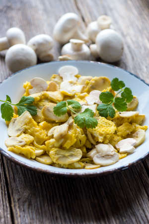 Scrambled eggs with mushroom and Corianderの写真素材