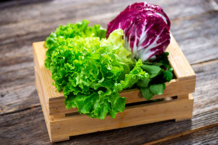 Lettuce on wooden backgroundの写真素材