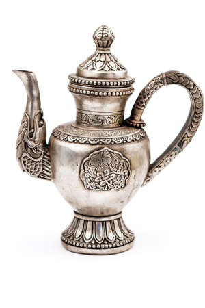 Antique silver teapot, isolated on whiteの写真素材