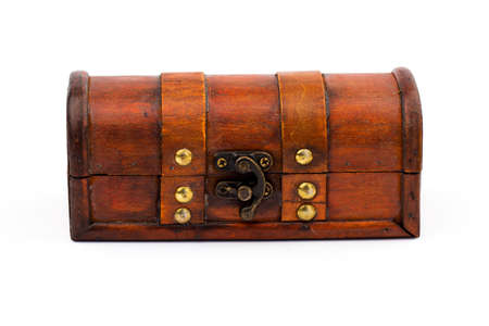 Closed wooden chest isolated on white background