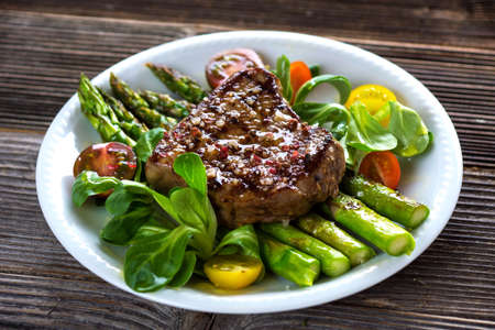 Beef steak with Grilled asparagusの写真素材