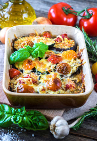 Eggplant,zucchini and tomato with mozzarella in Casseroleの写真素材