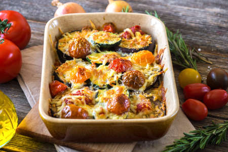 Eggplant,zucchini and tomato with mozzarella in Casseroleの写真素材
