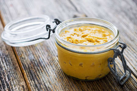 Homemade creamy peanut butter on wooden backgroundの写真素材