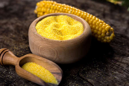 Corn meal or dry polenta on vintage tableの写真素材