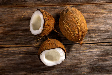 Coconuts on  wooden backgroundの写真素材