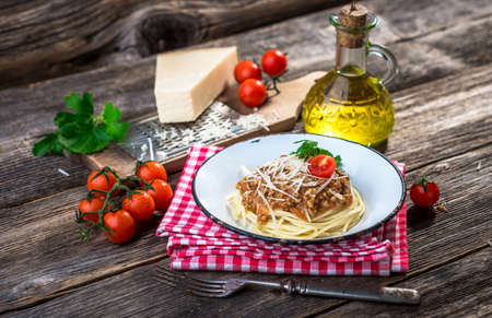 Spaghetti with bolognese sauce and parmesanの写真素材