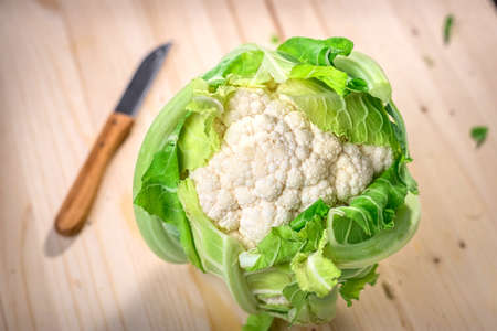 Organic cauliflower on wooden backgroundの写真素材