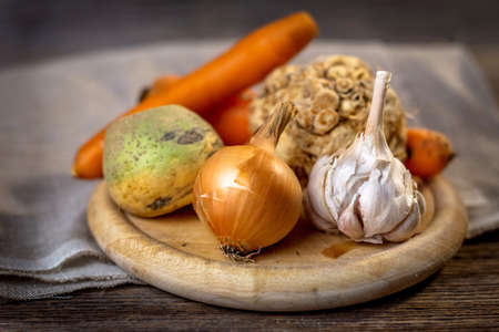 Basic ingredients for cooking on wooden backgroundの写真素材