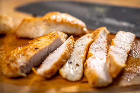 Grilled chicken breast cut into stripsの写真素材