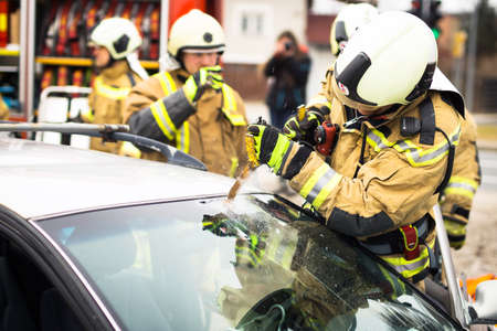 Firefighter in actionの写真素材