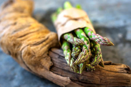 Asparagus on rustic wooden backgroundの写真素材
