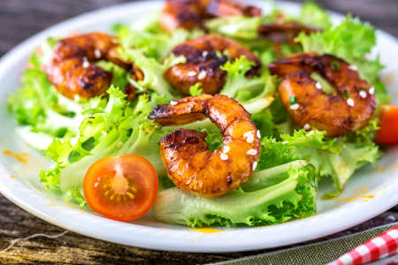 Salad with grilled prawns and cherry tomatoesの写真素材