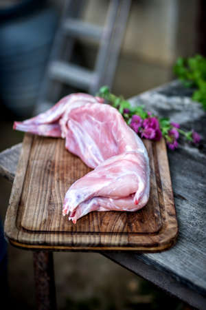   Raw fresh rabbit meat on wooden backgroundの写真素材