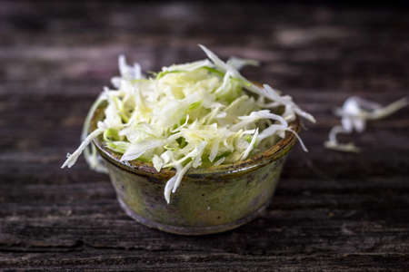 Cabbage on rustic wooden backgroundの写真素材