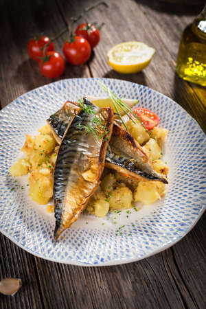 Roasted mackerel fillet with potatoの写真素材