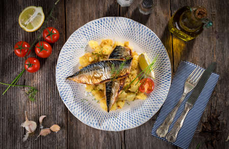 Roasted mackerel fillet with potatoの写真素材