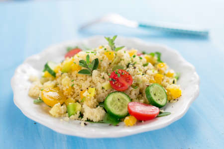 Healty salad with couscous  and vegetablesの写真素材