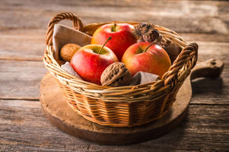 Apple on wooden backgroundの写真素材