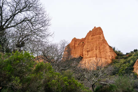 Las Medulas, Ponferrada, El Bierzo, Castilla y LeÃ³n, Spain. Panoramic view of the mountainous landscape of reddish sand of the Roman open pit gold mines.の写真素材