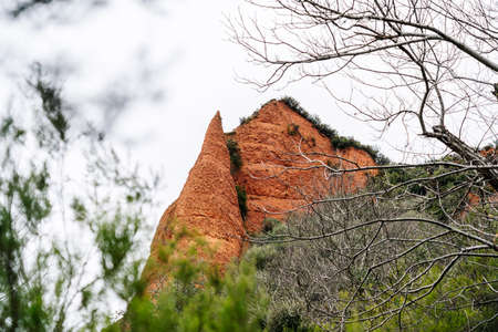 Las Medulas, Ponferrada, El Bierzo, Castilla y LeÃ³n, Spain. Panoramic view of the mountainous landscape of reddish sand of the Roman open pit gold mines.の写真素材