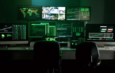 Hacker empty lair with multiple monitor screens and security cameras. Hacker dark hideout space.