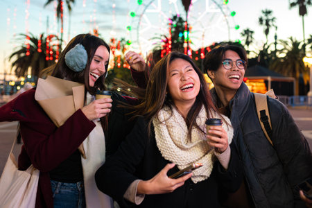 Multiracial friends having fun in the city. Asian young woman laughing with friends walking around...