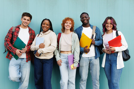 Diverse group of students standing together outdoorsの写真素材