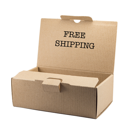 cardboard box for parcels from Ñraft isolated on white background with inscription free shipping, delivery concept, mock up, copyspaceの写真素材