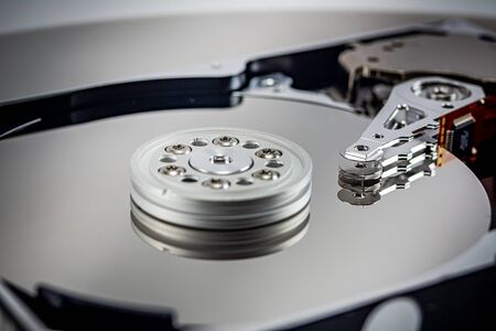 disassembled hard drive on white background, hdd, hard disk drive, close-up