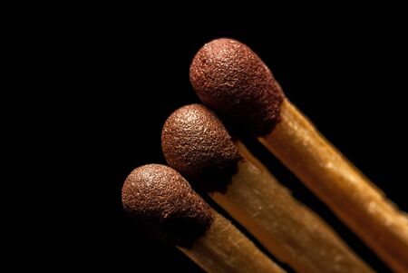match heads with gray, close up, macro, black background, fire safety conceptの写真素材